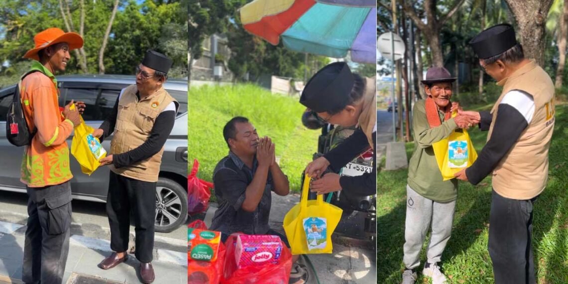 Ketua DPD LDII Kota Balikpapan H. Herry Fathamsyah turut membagikan sejumlah paket daging kurban kepada para pekerja jalanan, Jumat (6/6/2025). Foto: Istimewa